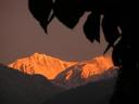 Sunrise lights up the peaks over Yuksom.